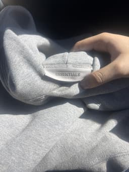 Fear of God ESSENTIALS gray fleece hoodie - AI says Real
