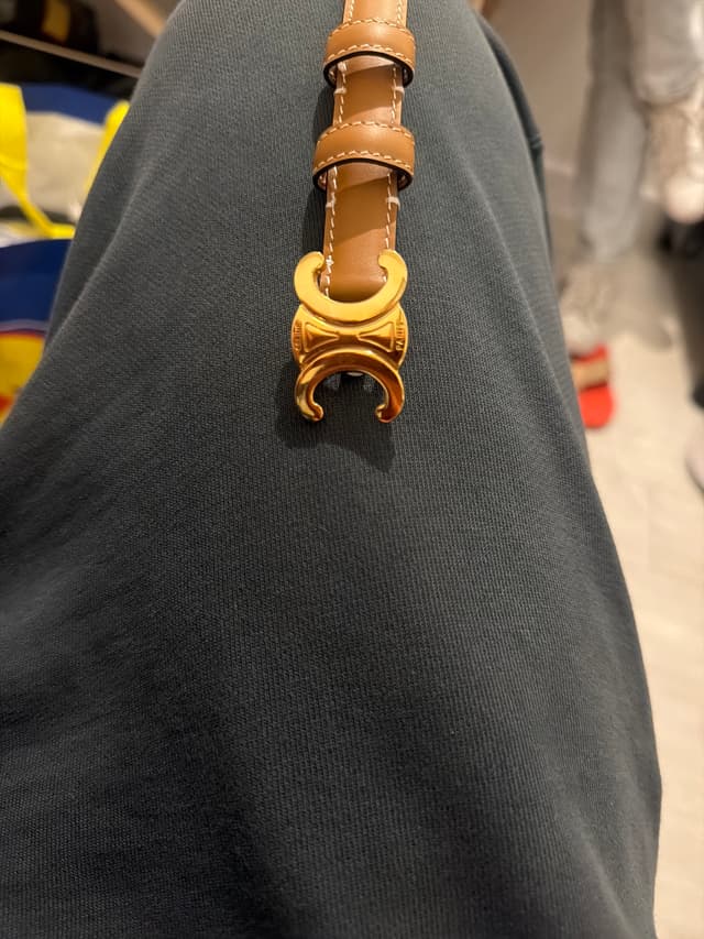 Celine vintage tan leather belt with gold-tone logo hardware - AI says Real
